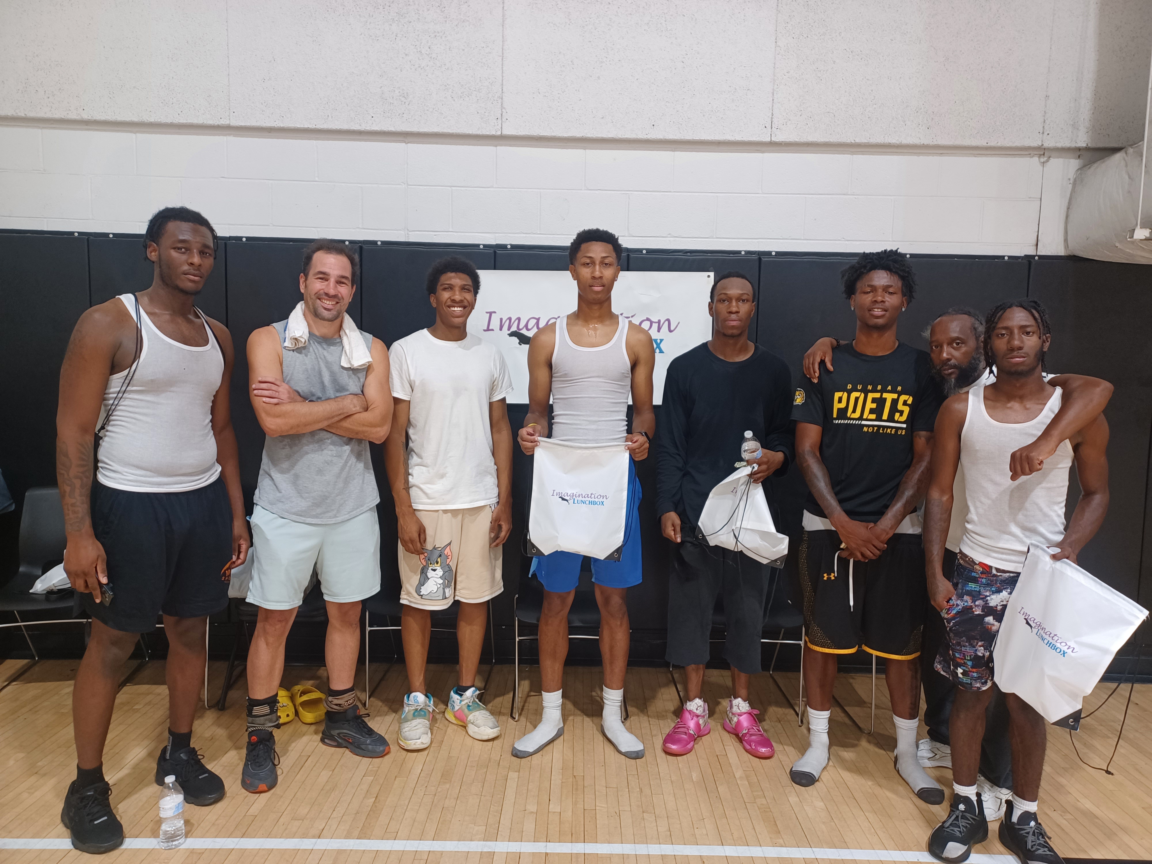 IL_2026_basketballGames_group_with_coachwinchester.jpg